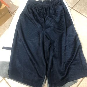 Boys Nike size Large blue and white b-ball shorts